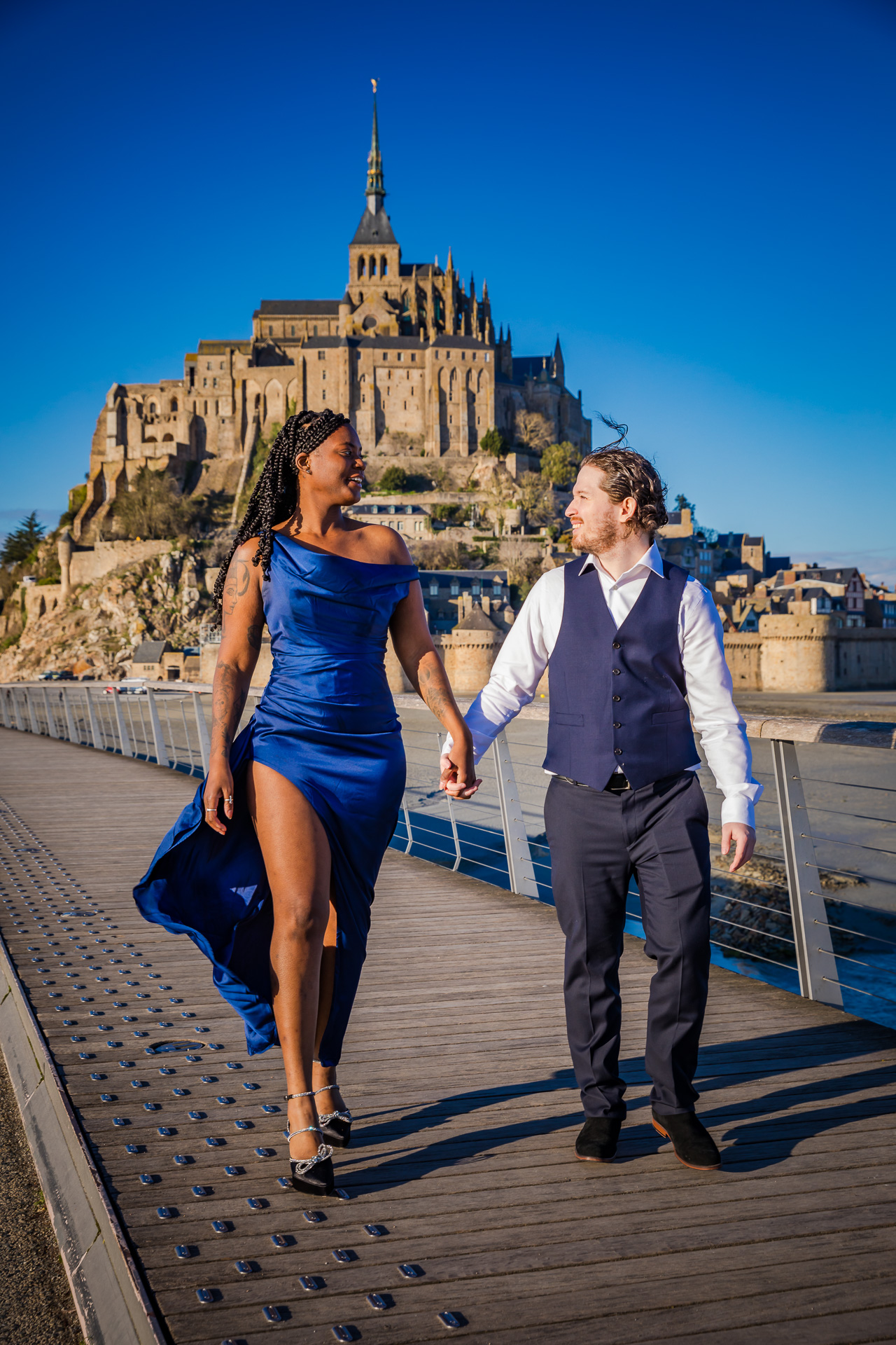 Engagement Photographer Bridge Proposal Spot at the Mont St Michel